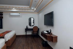 TV a/nebo společenská místnost v ubytování Trung Huyền Hotel