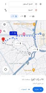 a screenshot of a google maps page with a map at غرف مجاورين المصطفى رباعي in Medina