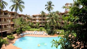 an aerial view of a resort with a swimming pool at Lillywoods Highland Beach Resort- Candolim in Candolim
