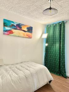 Ένα ή περισσότερα κρεβάτια σε δωμάτιο στο Home seventy - Guest House