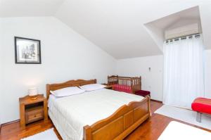 Postel nebo postele na pokoji v ubytování Apartments Jasna - family friendly