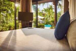 TV a/nebo společenská místnost v ubytování TUI BLUE The Passage Samui Pool Villas with Private Beach Resort