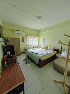 Postel nebo postele na pokoji v ubytování Nimman Rinkam Homestay