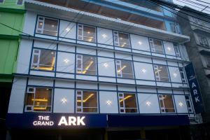a building with a sign that reads the grandark at The Grand ARK in Gangtok