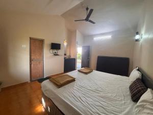 Postel nebo postele na pokoji v ubytování Hotel Sai Plaza