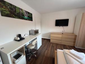 Μια τηλεόραση ή/και κέντρο ψυχαγωγίας στο Klockerhof Appartements I Rooms