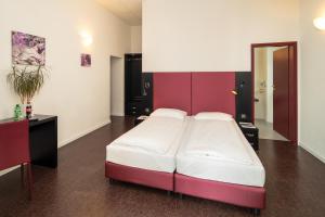 Ένα ή περισσότερα κρεβάτια σε δωμάτιο στο Hotel Rio Muralto