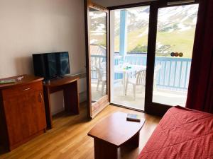 Televízia a/alebo spoločenská miestnosť v ubytovaní Résidence Pic Du Midi - Apt n°64 - 1er étage - Bâtiment Desman MAE-8654
