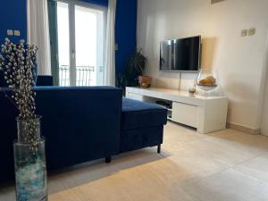 TV a/nebo společenská místnost v ubytování House Klarin