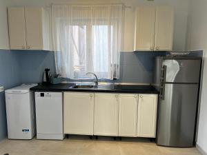 Kuchyň nebo kuchyňský kout v ubytování House Klarin