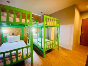 Postel nebo postele na pokoji v ubytování Frutta Hostel