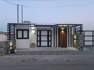 a rendering of a house with a garage at One Bedroom Pool House by Olivujoj in Anavyssos