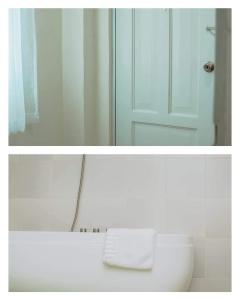 ein Bad mit einer Dusche, einem WC und einem Spiegel in der Unterkunft BELLADAMA HOTEL in San Carlos