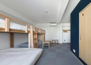 Postelja oz. postelje v sobi nastanitve DD HOTEL 中洲