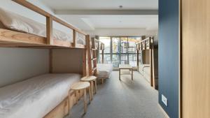 Postelja oz. postelje v sobi nastanitve DD HOTEL 中洲
