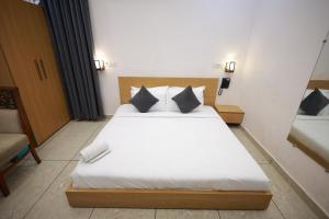 Katil atau katil-katil dalam bilik di Hotel Sagar Rutba