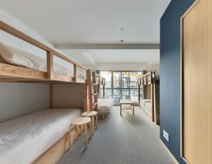 Postelja oz. postelje v sobi nastanitve DD HOTEL 中洲
