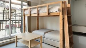 Postelja oz. postelje v sobi nastanitve DD HOTEL 中洲