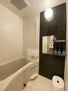 Kopalnica v nastanitvi DD HOTEL 中洲