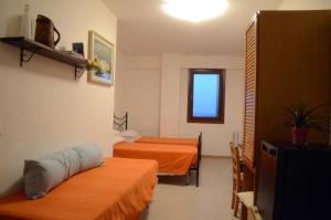 Postel nebo postele na pokoji v ubytování B&B Pontemare