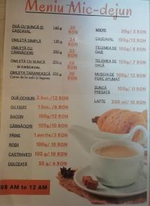 a menu for a cafe with a cup of coffee at Pensiunea Bucura in Călimăneşti