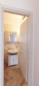 Vonios kambarys apgyvendinimo įstaigoje La casa di Cry