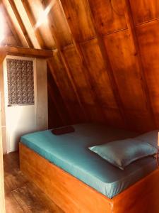 Postel nebo postele na pokoji v ubytování Nilaveli Sheen Coast