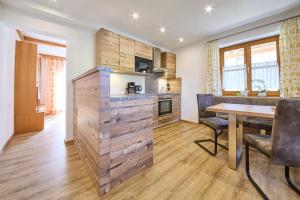 Kuchyň nebo kuchyňský kout v ubytování Miller Appartements