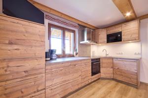 Kuchyň nebo kuchyňský kout v ubytování Miller Appartements