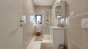 Koupelna v ubytování Casa Lavanda + 37 fotografií