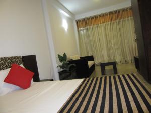 Krevet ili kreveti u jedinici u okviru objekta Miridiya Resort +13 fotografija