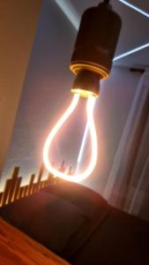 Ένα ή περισσότερα κρεβάτια σε δωμάτιο στο Luxueux appartement love avec Sauna