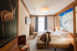 Posteľ alebo postele v izbe v ubytovaní Hotel Eden Rock