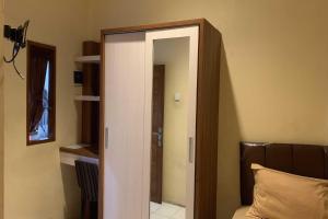 TV a/nebo společenská místnost v ubytování Residence 21 Syariah + 30 fotografií