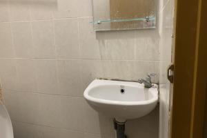 Koupelna v ubytování Residence 21 Syariah