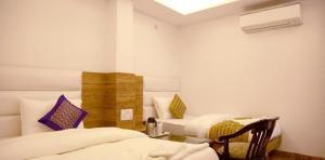 Postel nebo postele na pokoji v ubytování Hotel True Stay at New Delhi Railway Station