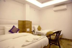 Postel nebo postele na pokoji v ubytování Hotel True Stay at New Delhi Railway Station