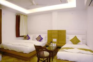 Postel nebo postele na pokoji v ubytování Hotel True Stay at New Delhi Railway Station