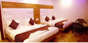 Postel nebo postele na pokoji v ubytování Hotel True Stay at New Delhi Railway Station