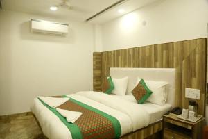 Postel nebo postele na pokoji v ubytování Hotel True Stay at New Delhi Railway Station