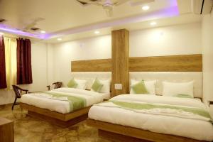 Postel nebo postele na pokoji v ubytování Hotel True Stay at New Delhi Railway Station