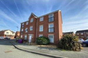 a large brick building on the side of a street at POTTERS LOGDE LIVERPOOL by Edl Ventures Ltd in Liverpool