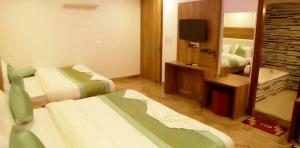 Postel nebo postele na pokoji v ubytování Hotel True Stay at New Delhi Railway Station