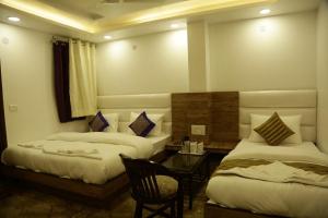 Postel nebo postele na pokoji v ubytování Hotel True Stay at New Delhi Railway Station