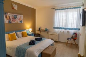 Katil atau katil-katil dalam bilik di Sabbia & mare