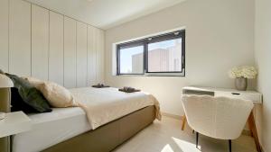 Postel nebo postele na pokoji v ubytování Casa Lavanda