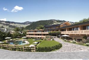 a resort with a pool and a resort at Mariengut - Natur Aparthotel Kramer in Wagrain