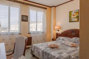 Postel nebo postele na pokoji v ubytování Vintage Hotel Tornese - Business & Events