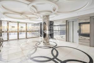 a rendering of a lobby with a chandelier at Casa Bravo Ivan Luxury Homes 1ªPta Sur 1ªLínea in Castellón de la Plana