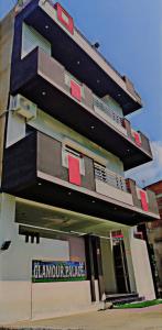a building with balconies on the side of it at Glamour Palace in Bodh Gaya